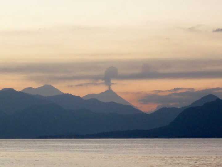 Sunrise over active Volcano at lake Atitlán Guatemala, Guatemala Travel Blog